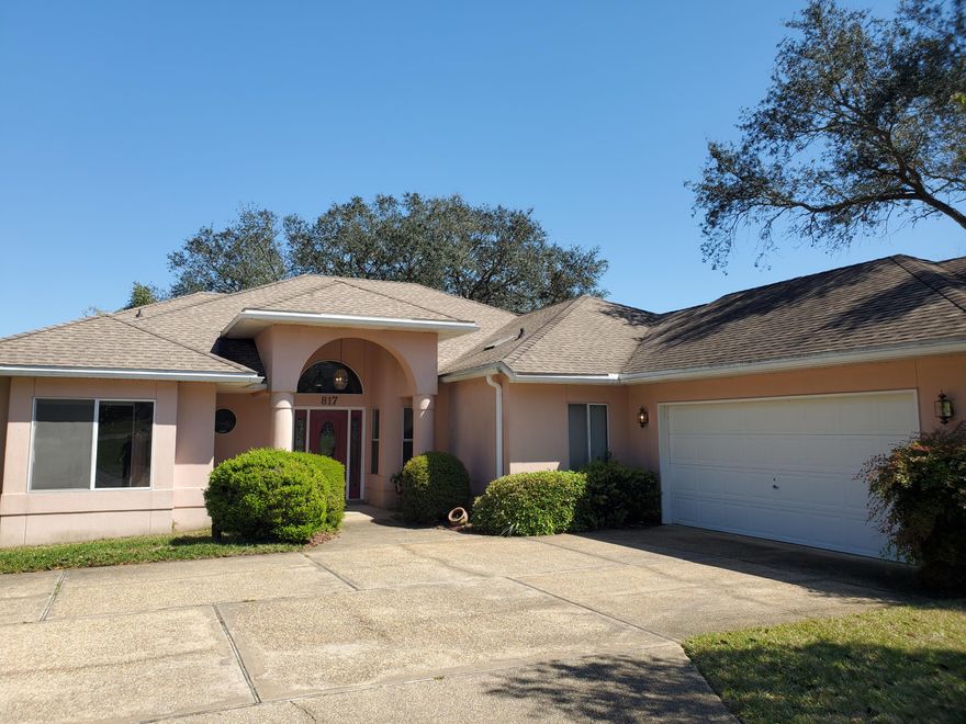 Enjoy the views of Lake Lorraine and wonderful outdoor amenities of this gorgeous waterfront property!  This property includes several outdoor features including a dock with a boat slip, beautiful landscaping throughout, and a large, screened porch that is perfect for entertaining.  The home showcases a formal dining room, a spacious family room with built-in bookcases, gas fireplace, & wet bar, and an eat-in kitchen with granite countertops, gas stove, & stainless steel appliances.  The owner's suite includes a sitting area, its own entrance to the screened porch, walk-in closet and double vanity in the bathroom.  The property is a short drive away from the shopping and restaurants in Downtown Fort Walton Beach.