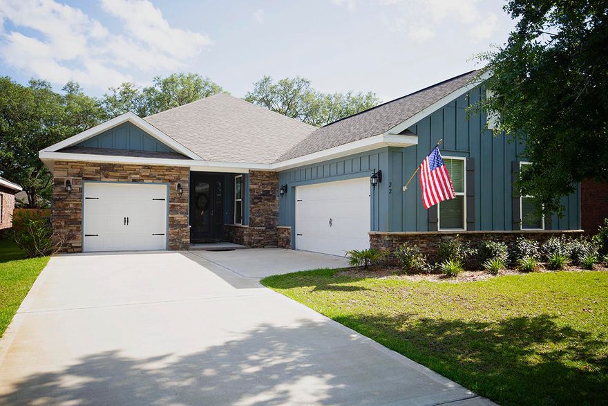 The Grand Caicos at Oak Grove, Shalimar.. This classy Craftsman home built by Whitworth Builders in late 2017 and has 3-Car garage(s) Double and separate Single Garages, and plenty of upgrades:. Tile floors, Granite Counter Tops, Kitchen Island, Double Ovens, huge pantry, computer station of kitchen, 9-foot ceilings, 8-foot doors, tiled walk-in shower... has all the improvements for excellent insurance coverage. covered Lanai and groomed treed yard... Very nice home, comfortable and fresh ...With this well built construction and amenities.. this home qualifies for reduced insurance...only $696 year ! Low Utilities ! Did I mention the 2 attached garages, one single, one double... hurricane shutters....treed lot...