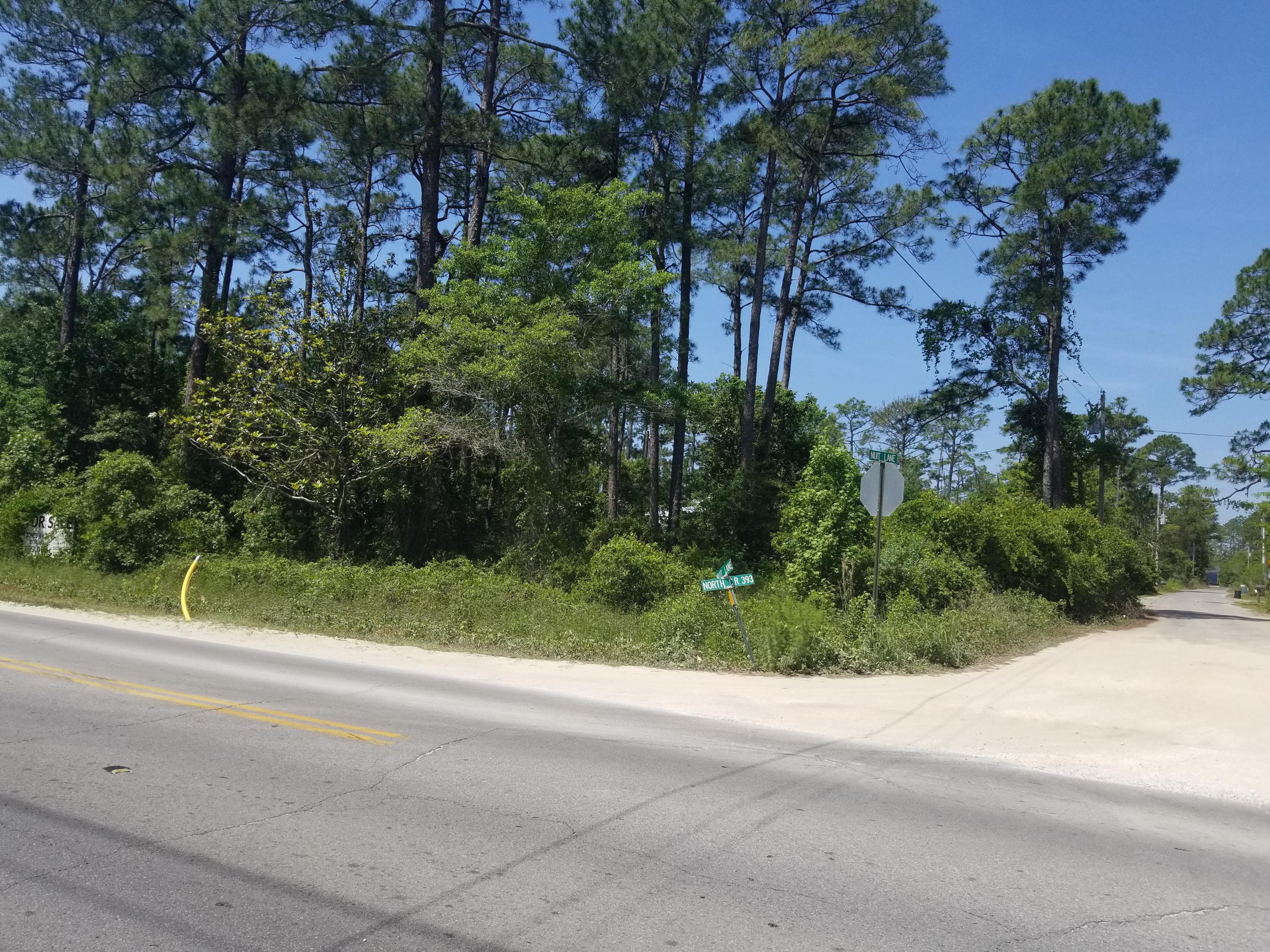 Plenty of possibilities for this lot located right off Hwy 98! The property is the intersection of Hwy 393 and Nuit Ln. The lot is approximately 150x100 and has ~150 ft of highway frontage. Zoning is Village Mixed Use.