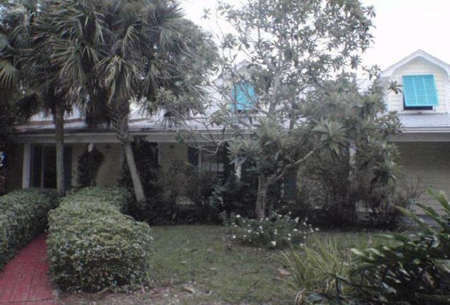 This property is a stone's throw from the water. Whether you choose to live the salt life here or earn rental income this house is on prime property. Two story home with 4 bedrooms and 2 and a half baths built in 1987. Variety of hardwood, tile, and stone work throughout home. Enclosed sun room and patio lead to in ground pool. Great for entertaining or vacationing. Shopping and dining near by.