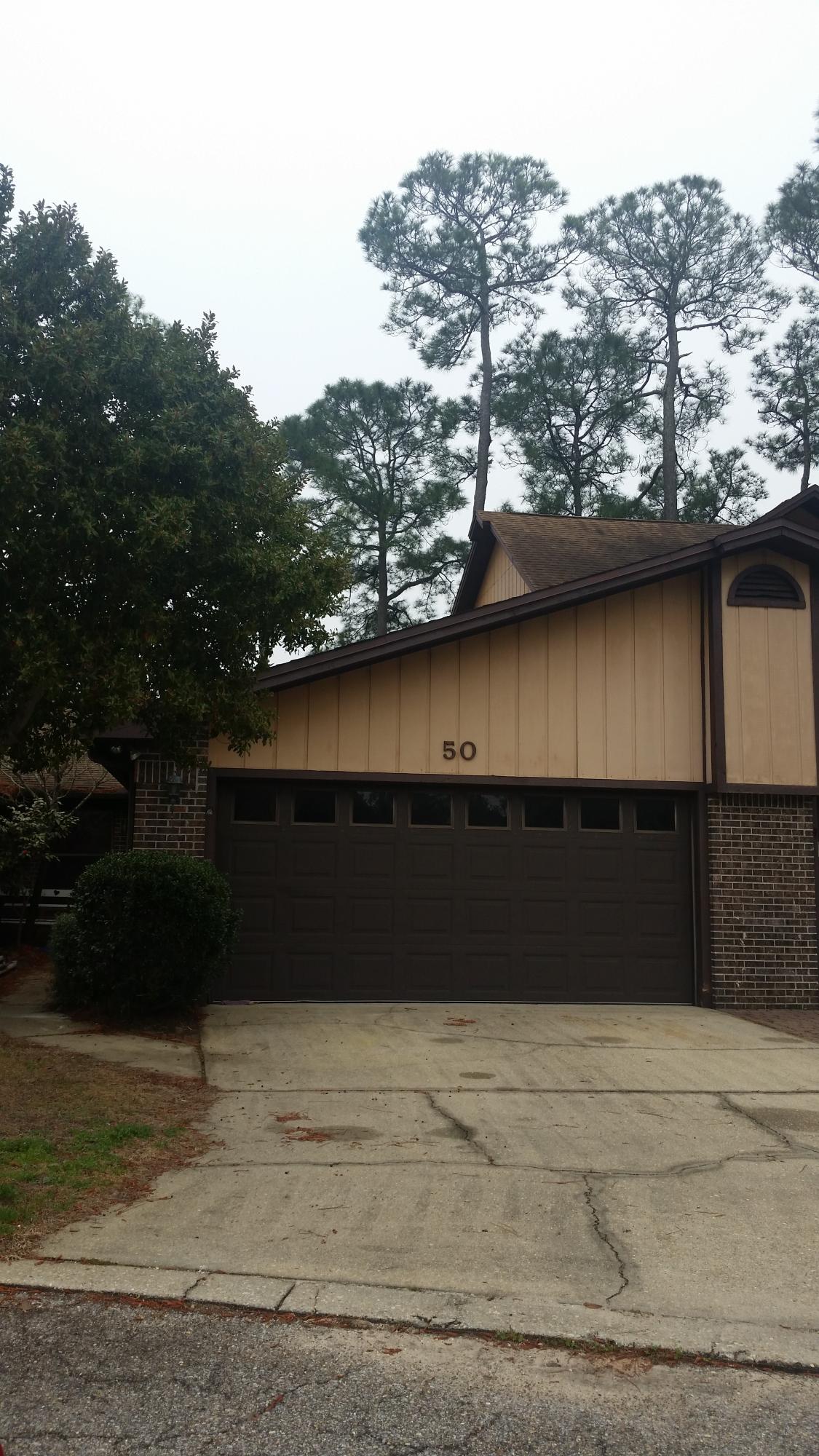 Your dream waterfront property awaits! The view is what will really knocks you off of your feet! This cozy townhouse has been kept in great condition with special features that make this property unique. Tom's Bayou sits right out your backdoor and can be seen from the inside of your spacious master bedroom. There is a walk-in closet inside the master bedroom that allows for extra storage room. The kitchen is covered with neutral colored tile as well as matching white appliances. Hanging off the kitchen is a quaint breakfast bar that leads to a large living room/dining room combination area. A dock and a boat slip is available at your fingertips! Don't enjoy the bayou? Take a dip at Hidden Cove's in-ground pool or practice your tennis skills at the court.