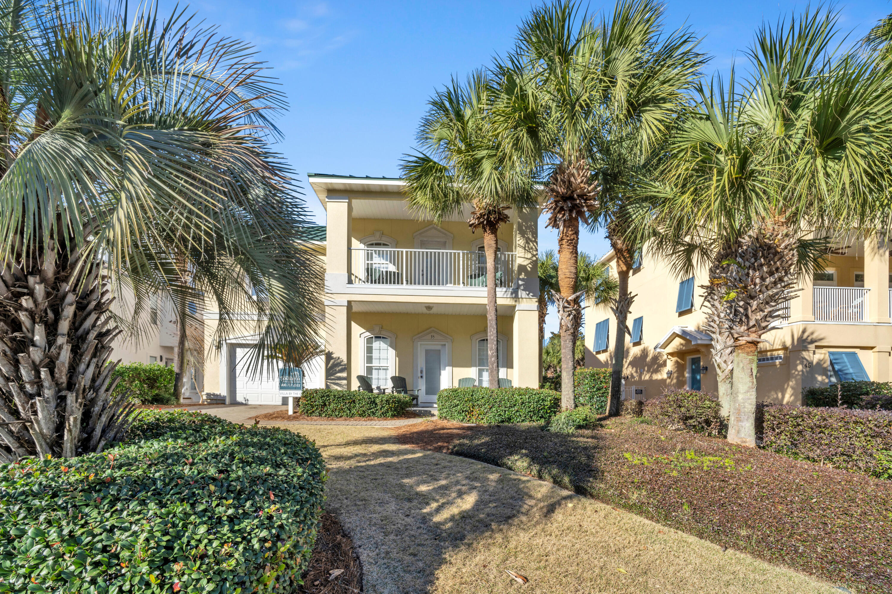 Home is with rental company but owner reserves holidays and family/friends most of the time. Rental projection 100-140K .A home that has room for everyone. 7 Bedrooms & one on every floor with two separate kitchens. Home is freshly painted, new bathrooms from vanities, commodes and showers along with a new second floor kitchen quartz countertop, Two laundry centers on the first floor. Patios on all levels. Gulf views from multiple areas. The complex is gated with one of the largest deeded beach area at 565 feet. Gulf front pool. Interior complex has a heated pool, Hot tub Tennis, exercise room and club room. Home is two lots to the beach access. Open large rooms on all three levels. Not far at all to shopping, restaurants and entertainment