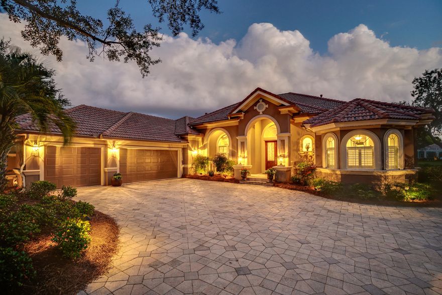 One owner, custom Sweet Homebuilders home on the coveted, peaceful street of Captains Circle in Regatta Bay. This sophisticated, yet relaxing haven makes the most of its tranquil, lakeside setting, allowing the beauty of surrounding nature and serene lake views to create a feeling of relaxation throughout. This home is located directly across the street from the Choctawhatchee Bay. It has distinct formal living and dining areas, and open kitchen and family room. Glass sliders to the enclosed, heated pool, outdoor kitchen, dining and living areas make entertainment effortless. The Master Bedroom Suite offers privacy and comfort. The Suite is designed to perfection as it overlooks the pool and lake, has direct access to the his/her closets and flows to a recently remodeled, luxurious Master Bath. The spacious bath has separate vanities with exquisite granite counter tops, an over-sized walk-in shower with heat lamps, and a centered soaking tub-completing the relaxing master suite.  The oversized three car garage offers ample room and a convenient staircase to the generous attic storage.  This home has a LOMA letter. Regatta Bay Golf and Yacht Club offers a serene upscale neighborhood along the Emerald Coast that is enjoyed by all ages. All owners and guests have privileges to tennis courts, pickle ball courts, a large Olympic size pool, kiddie park and pool, plus walking trails and nature preserves abound. The golf course is rated among the top in the state and membership is not mandatory to be a resident. It's just a short golf cart ride to the Gulf of Mexico, Destin Commons, Whole Foods, Lulu's, Legendary Marina and more!