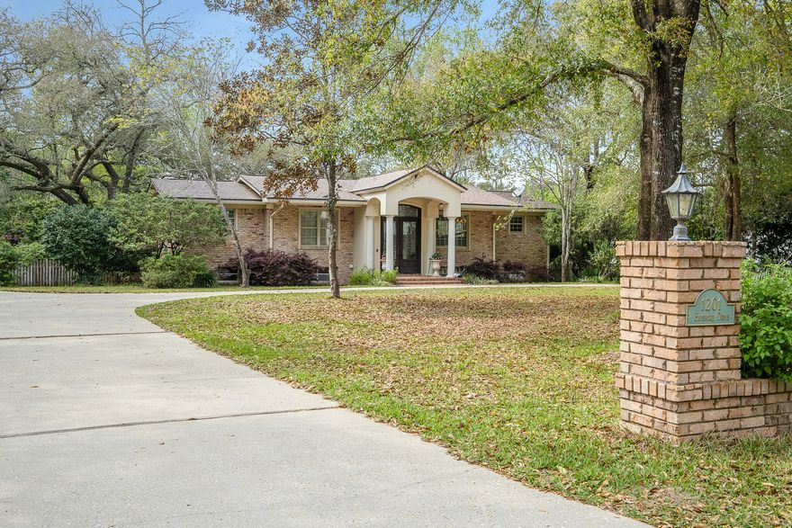 Wanting Niceville WATERFRONT just in time for summer? Here's your chance! DEEP WATER, NO HOA, and a NEW ROOF! It's rare for a true Boggy Bayou beauty like this home with southern charm to come on the market! Come view this enchanting 1 acre property that is located right off the coveted ''Bayshore Drive'' in Niceville! Enormous old oak trees surround the property and take you back to a slower pace in time. Allow the large driveway to lead you to the grand front doors matched with historical Chicago brick exterior. Inside this 3,587 sq ft home you will find 5 BR, 3 full BA, 2 living areas, large & updated kitchen, Florida room, and a walkout basement. Watch the sunset every evening off your 100 ft dock with an 8,000 lb boat lift! 44 ft of waterfront for your boat, kayaks, and paddle boards!