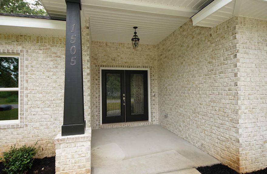 Another gorgeous home by Barber Custom Builders. This is the 1st of 3 homes the builder is developing on this street. Popular open concept, wood inspired tile throughout living spaces and carpet in bedrooms. Large kitchen island with white shaker cabinetry and granite top viewable in photos. Pendant lights hang over island, tiled backsplash behind stove with black stainless stove, microwave and dishwasher. Front room off your entry is perfect for a dining room or home office. Master bathroom will enjoy a separate tub and tiled shower. 2-10 builder's warranty and 1 year termite bond conveys with home.