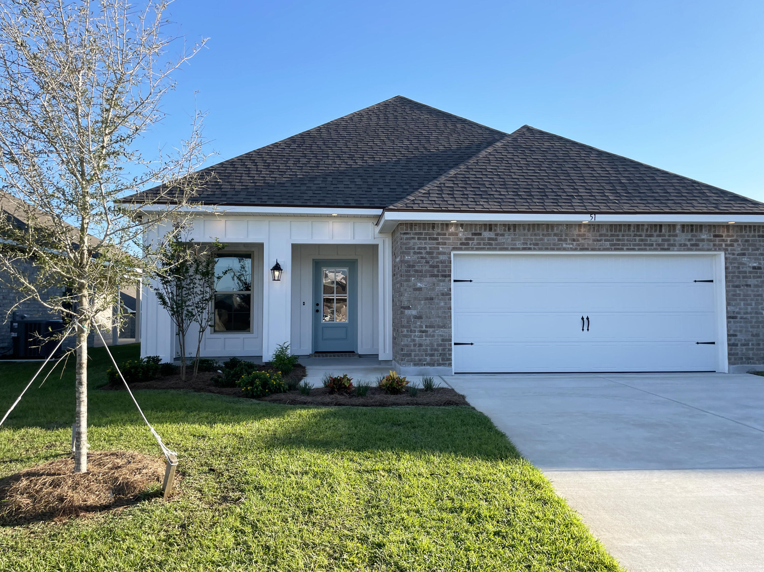 Awesome builder rate + choose TWO free: front gutters, refrigerator, smart home package, or window blinds. Restrictions apply.Located on a cul-de-sac lot the FRAZIER V G in The Bluffs at Lafayette community offers a 3 bedroom, 2 full bathroom open design. Upgrades added (list attached).Special Features: double vanity, garden tub, separate shower, and walk-in closet in master bath, kitchen island, pantry, covered rear patio, recessed lights, crown molding, framed mirrors in all bathrooms, undermount sinks, landscaping, architectural 30-year shingles, flood lights, and more!Energy Efficient Features: tankless gas water heater, kitchen appliance package with gas range, vinyl low E windows, and more! Energy Star Partner.