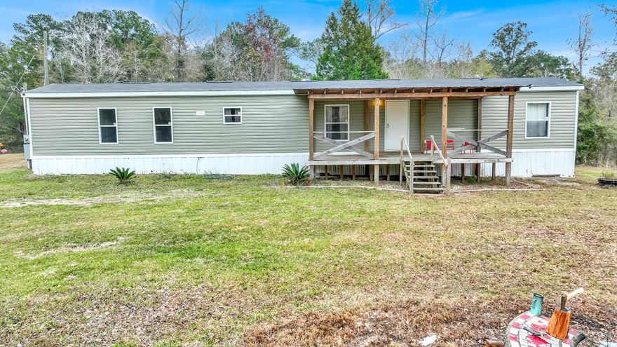 Welcome to your peaceful country retreat! This 3-bed, 2-bath mobile home, built in 2017, sits on 15 acres with a private driveway. Well-maintained and move-in ready, it offers a cozy living space. Enjoy the country life while staying close to town with easy access to Hwy 77. Schedule your tour today and make this serene property your new home!