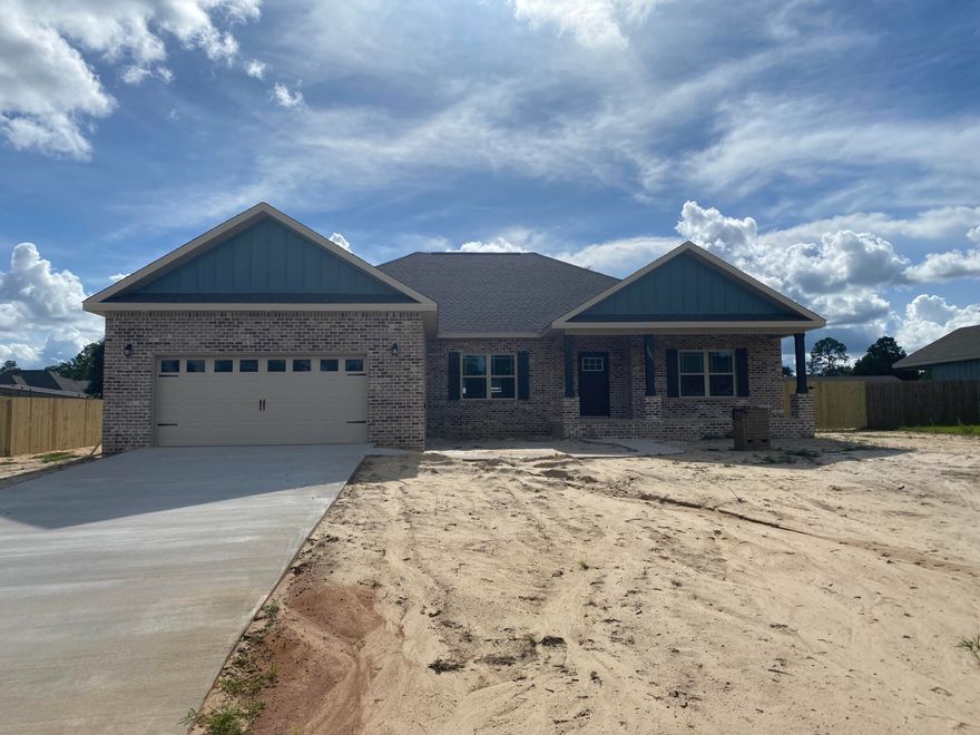 Gorgeous Parade of Homes winning builder is about to complete your next home! This is a 4 bedroom, 2 bath home with a large formal dining/office. Open floor plan. Wood look tile throughout, carpet in bedrooms. Custom two toned cabinetry. Fantasy Brown granite throughout. Trey ceiling in living and master bedroom. Tiled shower with glass enclosure. Large soaking tub. One story home on half acre, fully sodded and fenced yard. NO HOA! Stainless steel appliance package included. Ready 7/31.