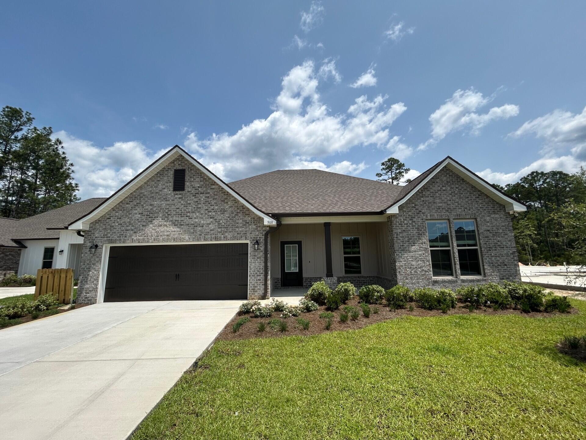 The COMSTOCK III G in Bird Song at Hammock Bay community offers a 4BR, 2BA, open design. Upgrades added (list attached). Features: double vanity, garden tub, separate custom tiled shower, and walk-in closet in master suite, kitchen island, walk-in pantry, boot bench in mudroom, covered front porch and rear patio, walk-in closets, crown molding, recessed lighting, framed mirrors, smart connect WIFI thermostat, smoke/carbon monoxide detectors, landscaping package, architectural 30-year shingles, flood lights, and more!Energy Efficient Features: water heater, kitchen appliance package, vinyl low E windows, and more! Energy Star Partner.