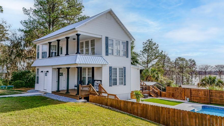 Discover historic charm with contemporary comfort in this 5 bedroom, 2.5 bathroom residence that has been transformed and overlooks Lake Jackson . This nearly 2,000 sqft gem has been meticulously remodeled while preserving its original character and soul. Every system has been upgraded for modern living--new metal roof, updated electrical and plumbing, plus dual heating and cooling systems. The kitchen showcases top-of-the-line appliances and jaw dropping upscale finishes.  Home features laundry on 1st and 2nd floors. Step outside to private oasis featuring inground pool with new liner & pump, surrounded by fresh decking and a privacy fence ideal for entertaining. New carport with storage adds convenience, The new gas tank and lines will be easy for your dream outdoor kitchen.  Call today.