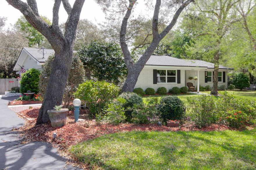 HUGE PRICE REDUCTION!! Welcome home to what living in Destin should be! Beautiful estate setting with lush lawn and mature trees. Located among prestigious estates on Choctawhatchee Bay and Joe's Bayou, this home is tucked away in the most desirable part of Destin; off the beaten path yet close to all the conveniences of a world class resort town. This huge lot boasts an established garden and still plenty of room for a pool, as well as RV & boat parking. Sturdy construction with improvements to warrant Wind Mitigation insurance savings. Additional attic insulation and high efficiency windows make this older home quiet and comfortable. This home is well taken care of and has recent upgrades to include crown molding throughout.