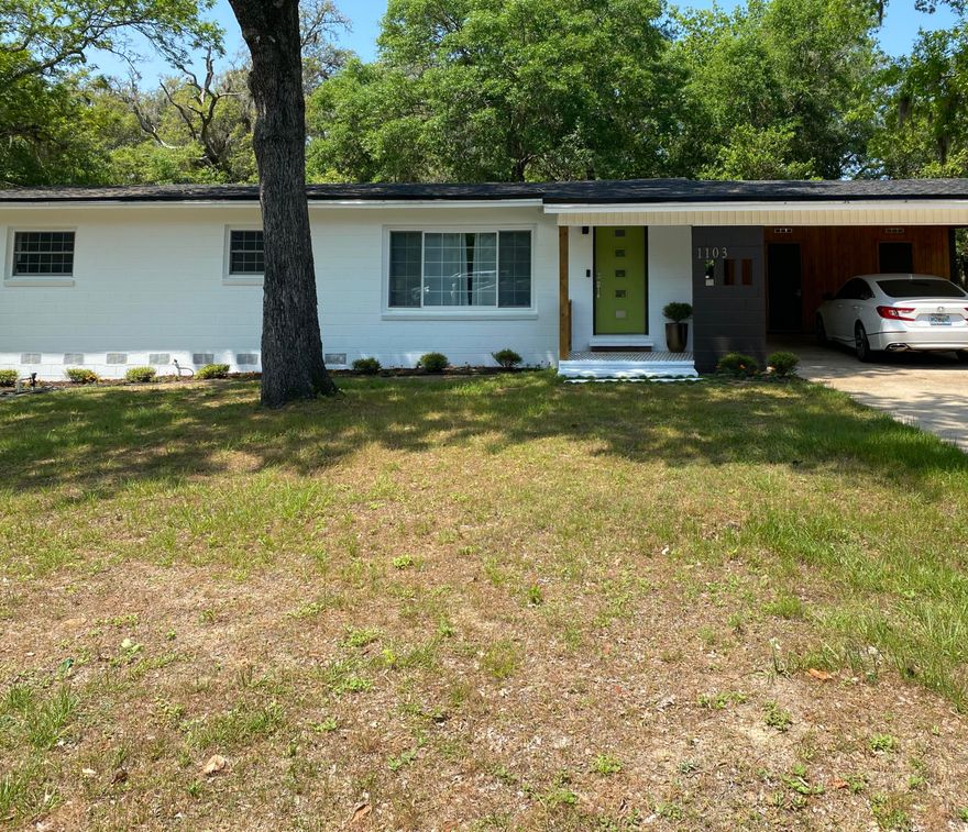 Multiple Offers. Highest best due.Great location within walking distance of The Wharf restaurant and Lions Park with a boat ramp, fishing and playground! Great big corner lot in Grey Moss Point subdivision. Only 1 block to Boggy Bayou and you have a view of the water from your kitchen window. This Mid Century home has been beautifully renovated. Great curb appeal. New roof 2018. (7500) Freshly painted exterior with Bulldog primer too. (5000) Ring doorbell and several Ring security exterior sensor lights. Custom pattern wood railing (2500) by front porch and in two car carport. Home has been rewired (8k) and all new insulation in the attic (4k). Walls removed (4k)and now a very open floorplan.