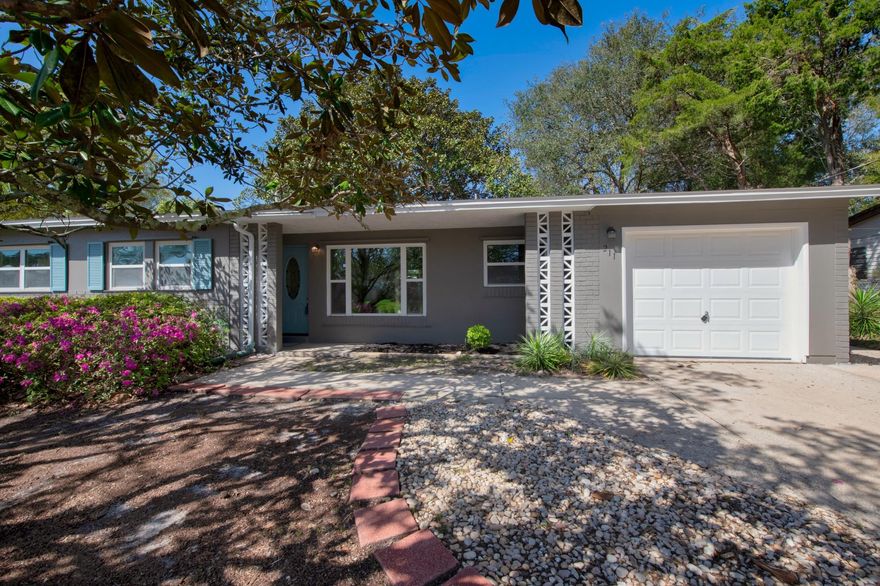 BEAUTIFULLY RENOVATED!! This adorable, fully updated and affordable 3BR/2 BA home is move-in ready and conveniently located within 2 miles of Hurlburt Field! From top to bottom, you will find a long list of updates and custom features that will appeal to all Buyers. You'll have peace of mind with the NEW ROOF, NEW GAS WATER HEATER, and HVAC system that is <2 years old! Home has all new copper wiring. You will enjoy the flow of this home, which features fully updated kitchen and baths, and lots of natural light. The kitchen boasts Shaker-style cabinets with European hinges and soft closed drawers, floating shelves, elegant granite countertops, modern mosaic backsplash, and all new appliances. Both bathrooms have been upgraded with new vanities, tiled shower/bath surround, updated LED lighting, and new plumbing fixtures. The home features water resistant laminate flooring in all main areas of the home, including the master bedroom, and there is waterproof LVP in both baths. The 2 guest bedrooms have new wall-to-wall carpet. Lighting fixtures have been updated to include ceiling fans and LED. Walk thru the sliding glass doors off the family room to access the large backyard with concrete patio, privacy fence, and plenty of mature trees for added shade and comfort. As a bonus, the home has all new interior and exterior paint; an oversized 1-car garage; as well as vinyl windows and hurricane shutters for an additional insurance discount and added safety/efficiency. Home is on a quiet street with easy access to bases, schools, beaches, and shopping. You do not want to miss this home! Make it yours today!