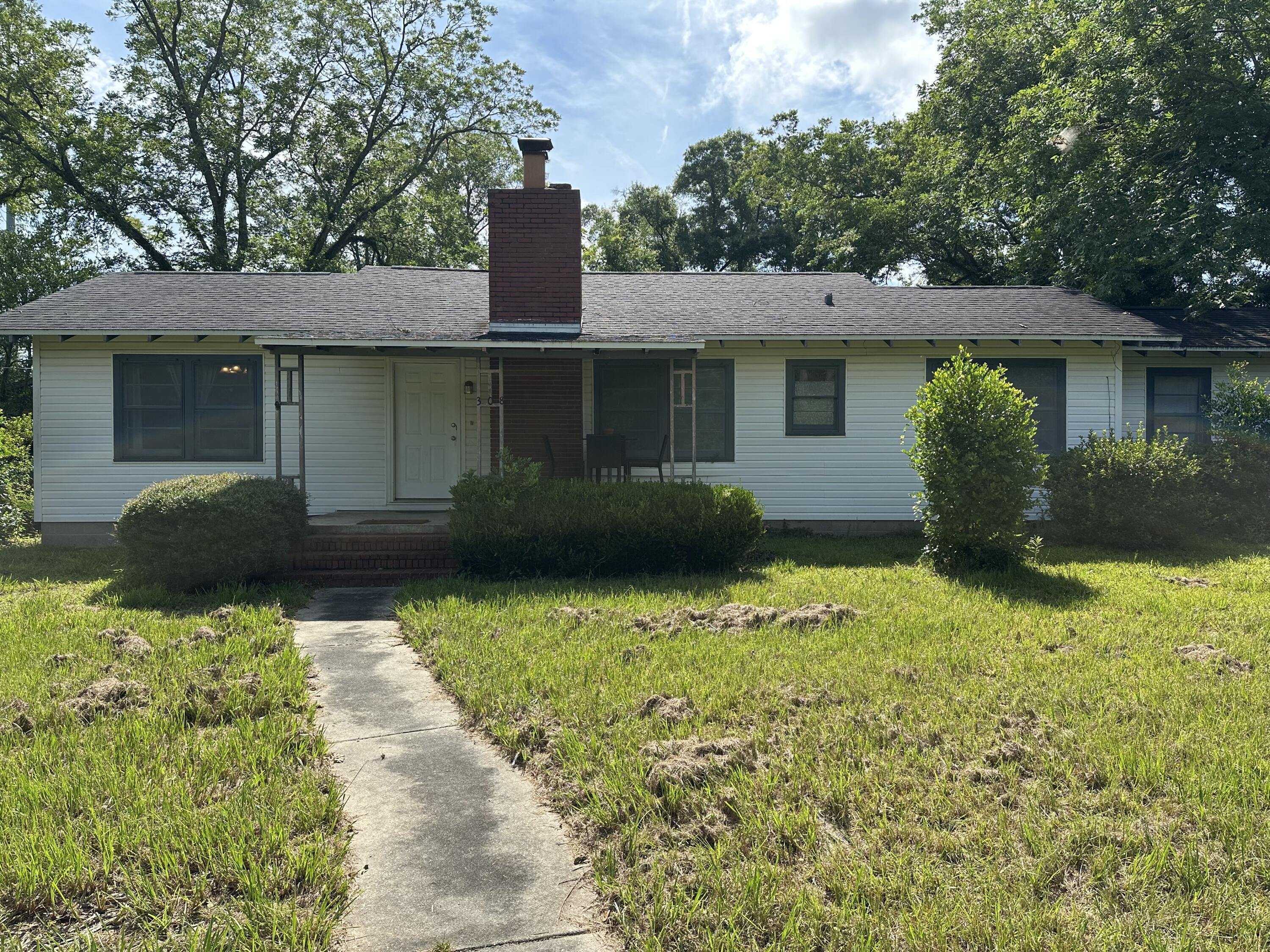 Lovely home in the heart of Bonifay, FL. This quaint home features beautiful hardwood floors, built ins and a fully fenced yard. There are 3 bedrooms and 1 bathroom, an oversized living room, built ins in the dining room and an adorable front porch! Depot Street is a quiet street featuring a two acre city park less than 50 feet from this home's front door.