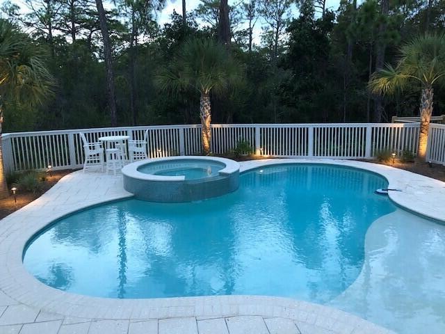 ENTERED FOR COMP PURPOSES ONLY. Sandcastle Plan offers 2 stories, 3133 square feet, 4 BR/4.5 BA, Spacious 1st floor owner's suite and expansive closet. Living room with fireplace is open to kitchen and breakfast room. Outdoor living and porches galore on this home with 4 covered porches - 2 overlooking preserve! Wood floors throughout the whole house, outdoor shower and private pool.