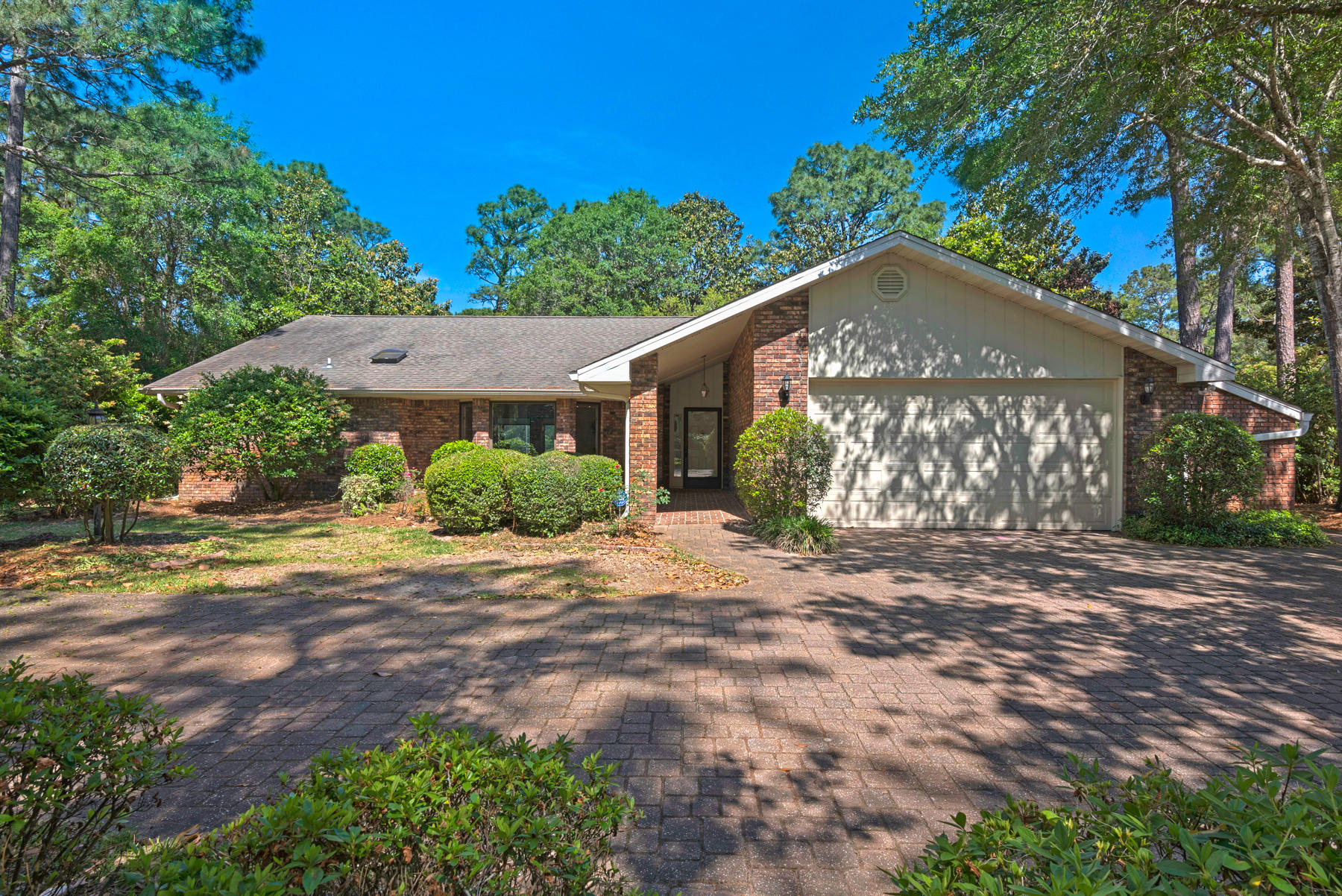 Nestled in the heart of Bluewater Bay, this classic, HEATED pool home is move in ready! Tucked away on a beautifully landscaped, half-acre, corner lot, this home boasts golf course views, privacy, and a lush outdoor oasis to enjoy the warm summer days outside! This single level, 3 bedroom, 2 bath home features new custom updates and tailored finishes throughout. The 2305 sqft live LARGE with 2 living spaces, 2 dining spaces, a gorgeous centrally located kitchen, oversized laundry room, and 11x30 tiled sunroom that opens to the screened pool! The location is perfectly placed in BWB, zoned for Bluewater Elementary, next to sidewalks and a 3 minute bike ride to the BWB pools, golf course, and driving range, and just a short drive to local military bases and the Mid-Bay bridge! Read more...