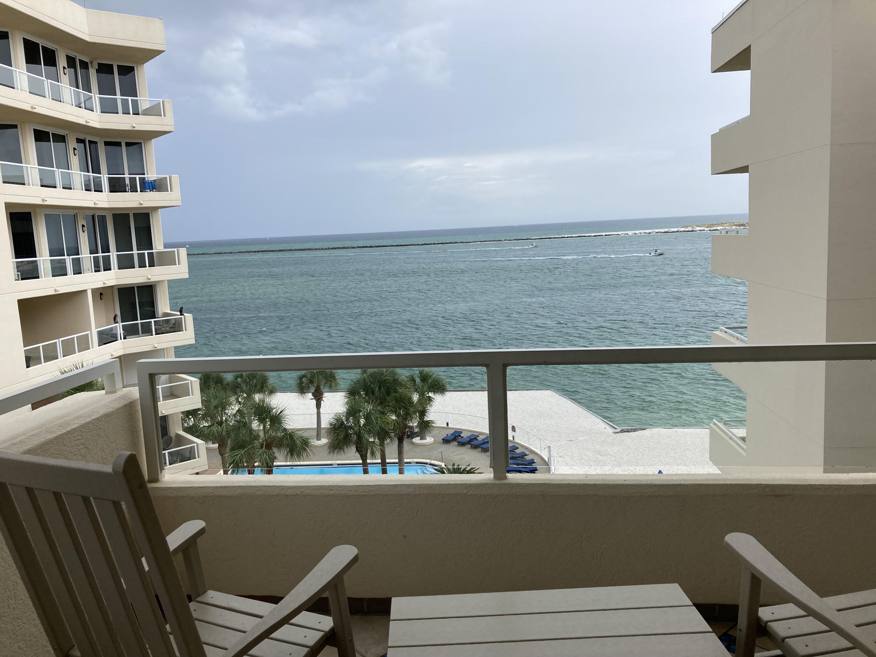 Beautifully updated 5th floor Gulf front unit. Freshly painted throughout. Tastefully furnished with every thing needed for vacation rental or personal use. Assigned garage parking space and owners storage separate from the unit are included. The oversize balcony offers views of the Gulf and the East Pass. East Pass Towers features waterfront pool & spa, beach, fitness center & a full service marina. Water taxi accessible close by to access the many great restaurants, shops and Harbor boardwalk nearby. Gated community offers extra security with elevators that require a code to access the enclosed covered unit entry areas giving a very boutique and high end resort feel to the complex. This is one of the best values in Destin.