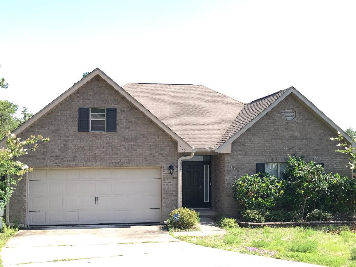 This beautiful home is located in the popular Rolling Ridge subdivision, on a large fenced in lot. A nice sixe 12x14 deck overlooks the backyard. You will notice lovely wood flooring leading into the Great room which has a cathedral ceiling. This House has an open, split bedroom floor plan with a large dining area and kitchen which also has a breakfast bar.