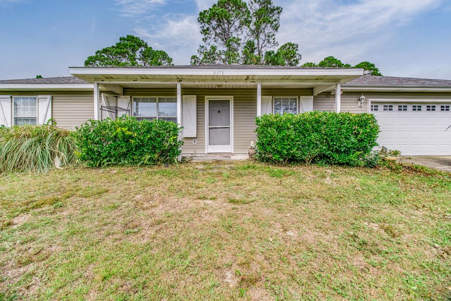 This home is ideally located in the central part of Navarre only minutes from schools, Publix, Wal-Mart, and the Navarre Beach bridge which takes you over to the beautiful white sandy beaches and emerald green waters of the Gulf of Mexico. This home offers the popular split bedroom floor plan with the master bedroom and bath on one side of the house and an additional two bedrooms on the other. The fourth bedroom is strategically placed off the kitchen and could easily be used as an office. Tasteful and low-maintenance tile flooring has been installed in all rooms for easy cleanup. Enjoy grilling and entertaining in the almost half-acre backyard.