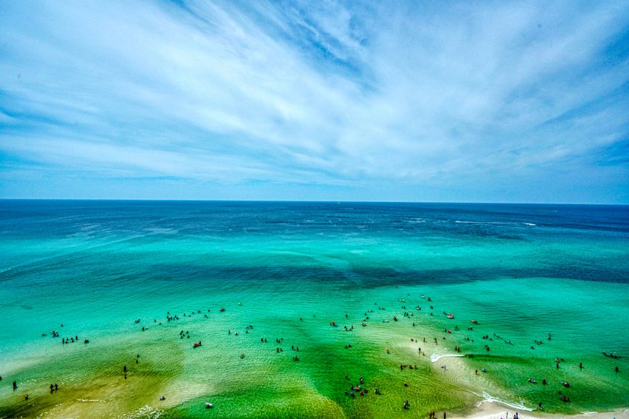 Gulf front condo with endless views from the bedroom and living room. Storage unit included! The bunk room is situated in its own space with a full bathroom and closet. The large open kitchen allows for expansive gulf views and plenty of room for everyone to move around. Tidewater Beach Resort is a quick 18 minutes from Northwest Florida Beaches Int'l Airport, less than a mile from Pier Park & The Russell Fields Pier, under 2 miles from Frank Brown Park (a national sporting tournament locale), and about 16 minutes to Scenic Highway 30A. But you won't need to leave to be entertained! At Tidewater you will find 2 outdoor pools and an indoor heated pool, beach front fitness center, steam room & sauna, 4 hot tubs, a tiki bar, restaurant, movie theater, conference room and an owner's lounge!