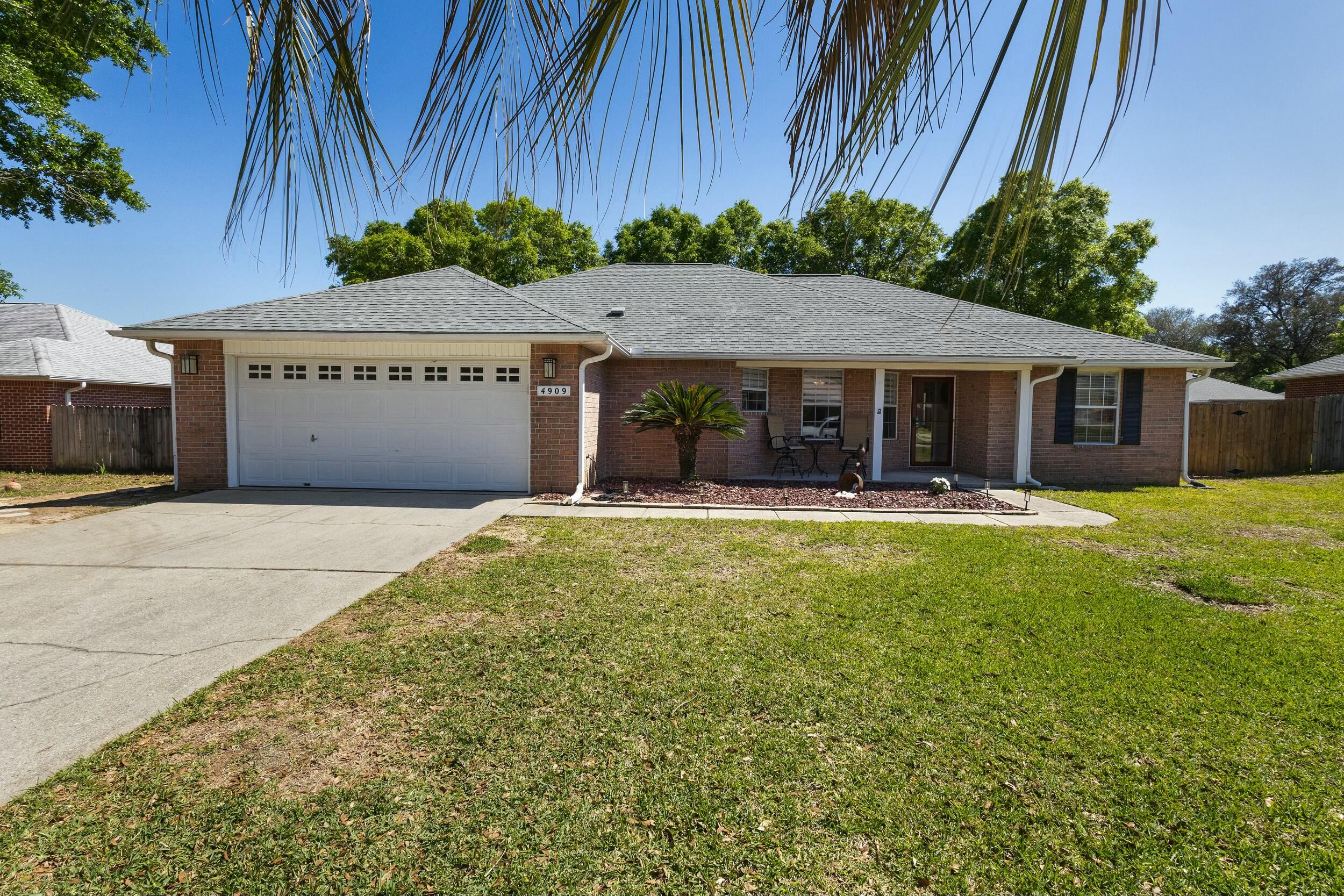 This beautifully maintained 1,914 sq ft home sits on a spacious .32-acre lot in one of Pace's top school zones. Enjoy Florida living with a saltwater screened-in pool, perfect for outdoor relaxation and entertaining. Inside, the open floor plan features tile and LVP flooring throughout, a modern kitchen with granite countertops, stainless steel appliances, and a coffee bar with a sink. The split bedroom layout offers privacy, with a spacious primary suite that includes a walk-in closet, soaking tub, and separate shower.Notable upgrades include a 2017 roof (50 yr), Lennox HVAC system (2016), 2021 water heater, and a new pool salt cell (2023). The backyard is fully fenced for privacy, and the home is conveniently located near shopping, dining, and top-rated schools.