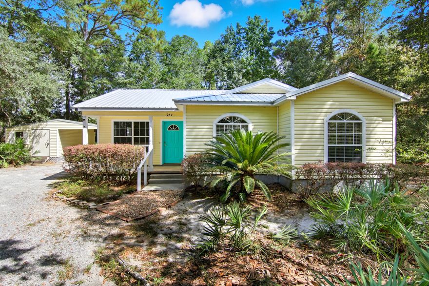 *Information Purposes Only* Once upon a time, there was a little Florida cottage tucked among the palms in Freeport. It wasn't flashy or loud--it was the kind of home that instantly made you feel welcome, the kind of place where time slows down and the world feels just a little softer.This 3-bedroom, 2-bath retreat features an open-concept living area, a new metal roof, and all appliances conveying for your convenience. On over half an acre of lush, tropical greenery, mornings are best spent with coffee on the screened-in porch, while evenings invite quiet conversations beneath the stars.But this cottage offers more than charm--it offers freedom. With no HOA, you're free to create the lifestyle you've been dreaming of. A 20x10 storage building