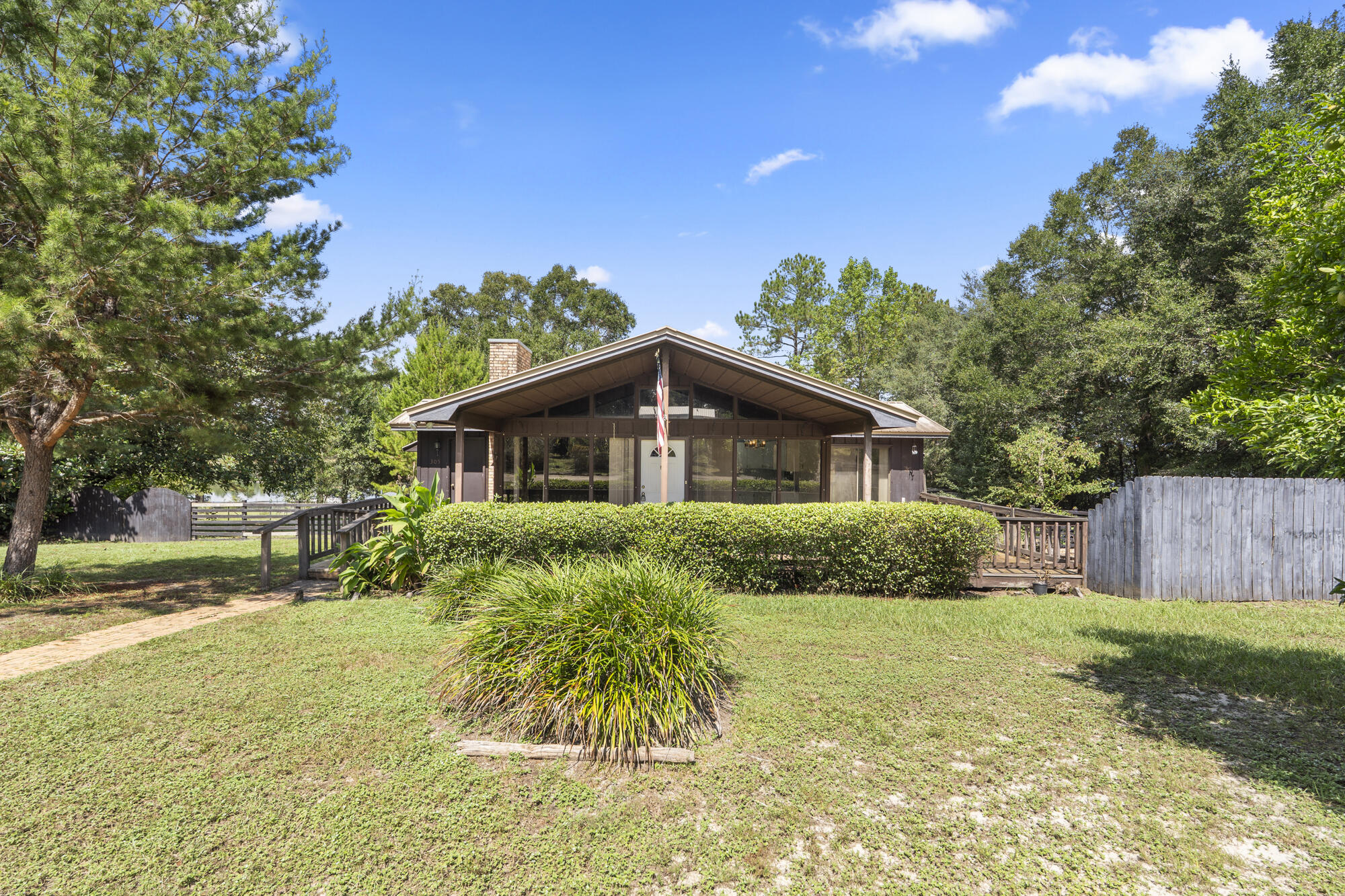 FISHERMAN'S DREAM! Waterfront home on Lake Juniper! Escape to your lake house situated on Juniper Lake, a state-managed 600+ acre fishing lake renowned for its trophy largemouth bass, bream, and crappie. This property offers a rare opportunity to own a waterfront home at a reasonable price on an oversized lot in a peaceful neighborhood--perfect for fishing enthusiasts, nature lovers and anybody who dreamed of one day owning Florida waterfront property! Easy to show