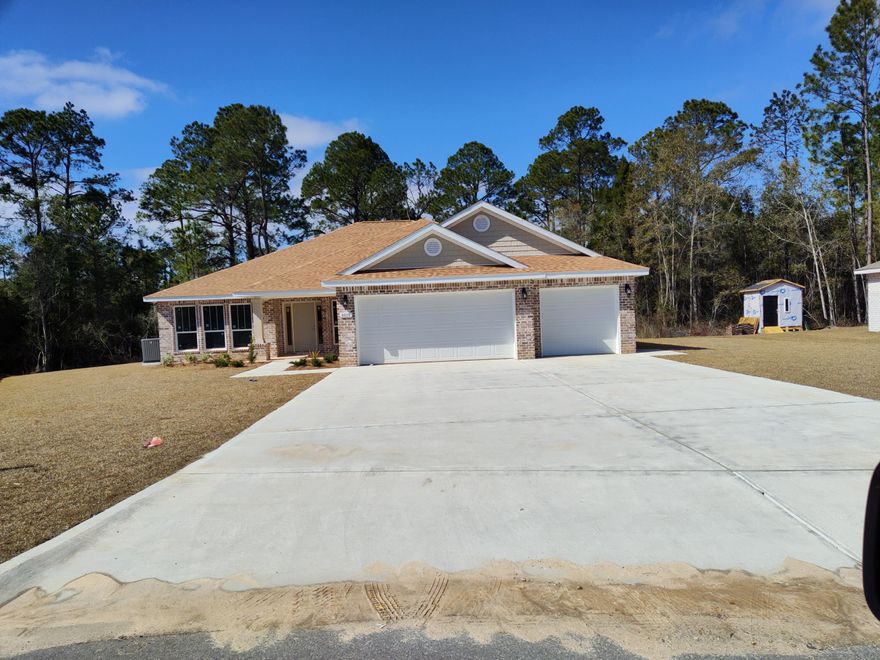 NEW BUILD IN THE PRESERVE IN MILTON! -Wide open floor plan with 10 foot ceilings-stainless steel appliances and granite counter tops in kitchen-covered front porch and lanai-large master suite with dual vanities, garden tub and separate shower-ceiling fans -low E tilt in  windows for easy cleaning--sodded front, side and back yards with sprinkler system featuring Rain Bird sensor and automatic timer-half acre lot. The Preserve is convenient to I10, less than 30 minutes to Navarre Beaches, downtown Pensacola and the Cordova Mall.  All lots in The Preserve are on public water and sewer, NO SEPTIC TANKS, and there is plenty of room in the back yard to put a pool, shed or workshop or to store your RV, boat and other toys. Come by our model @ 4994 Red oak Drive Milton FL in The Preserve