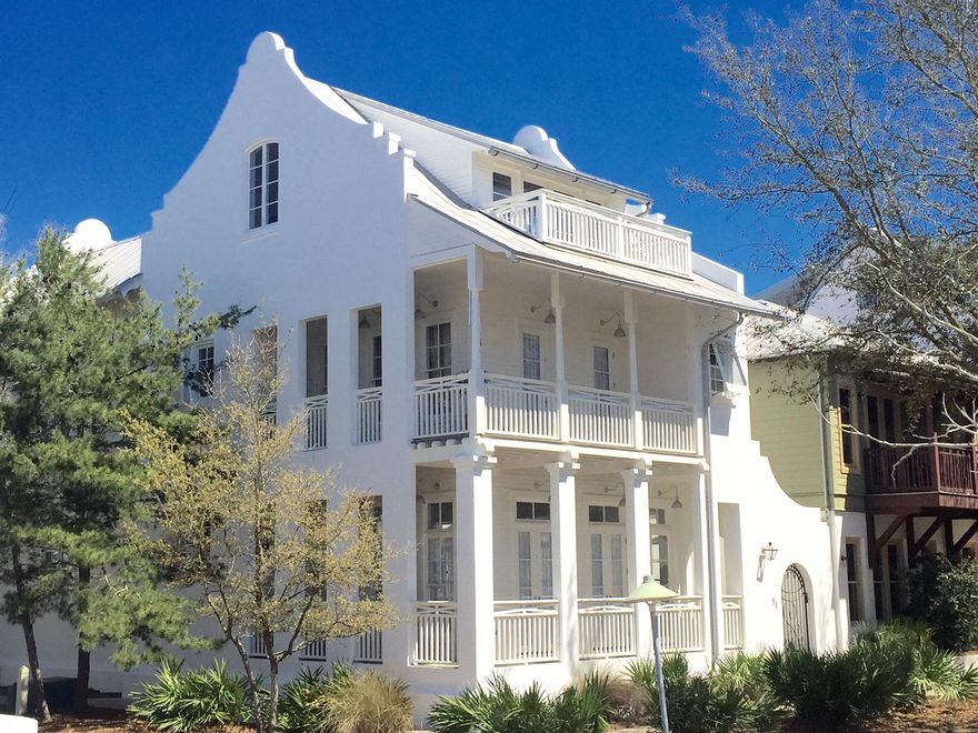 This newly refreshed Rosemary Beach classic courtyard pool home resides on a 'prominent corner' that is convenient to the beach, village, and pools. Designed by noted architect Julia Starr Sanford, this Dutch West Indies masterpiece exudes strength in its white stucco masonry. Its graceful parapets draw inspiration from Rosemary Beach's landmark buildings.With three floors, 98 W Long Green offers ample living space and privacy.The all new courtyard features rich peacock pavers and a crisp redefined pool. The exterior and all interiors have been freshly painted in a popular all-white palette.This sold furnished home features a blend of coastal weathered furniture, leather sofa and rustic accent pieces.