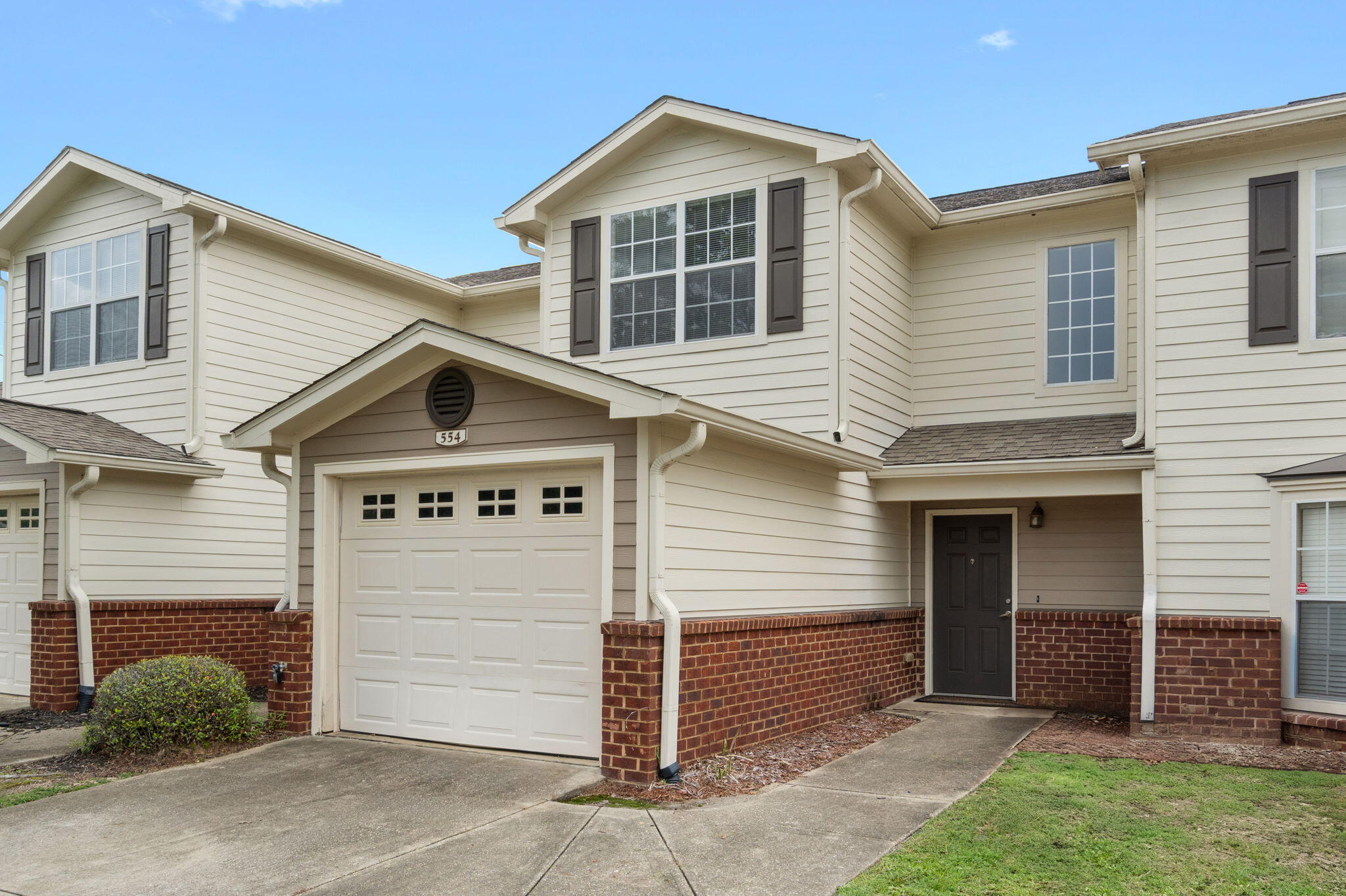 Immerse yourself in the charm and comfort of 554 Wingspan Way, a delightful townhouse nestled in the heart of Crestview, FL. This spacious 1264 sq ft home offers a perfect blend of modern living with its thoughtful layout featuring two cozy bedrooms. Enjoy the convenience of two full baths and a half bath, ensuring ample space for relaxation and privacy. Step inside to discover a welcoming atmosphere that invites you to unwind and create lasting memories. The open living areas are designed to cater to both intimate gatherings and lively celebrations. Natural light streams through the windows, enhancing the warm and inviting ambiance throughout the home. Experience the ease of living with everything you need just within reach.
