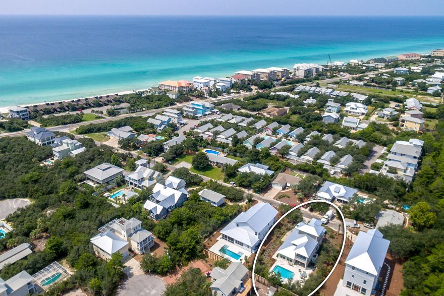This beautiful two year old home features 4 bedroom, 4-1/2 bath w/approximately 3000SF builders custom personal home w/spectacular outdoor space, private pool, fire place,outdoor kitchen and more than 1000SF of covered porches. Situated on a large homesite with deeded beach access. Main floor is an open concept plan with the ability to open triple folding doors to bring the outside in. First floor also includes a master suite with exquisite bathroom featuring a soaking tub, shower w.spray jets and lg walk-in closet. Main level also offers laundry room, living room, dinning area, kitchen hall bathroom and wet bar area. The second floor boasts another master suite w/private covered porch, additional bedroom and bathroom. Then continue to third level with an open bedroom, full bath and private