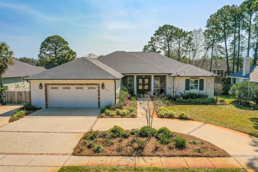 Beautiful and move in ready, one story home with open floor plan located in the prestigious, sought after Indian Trail neighborhood. This all brick home was professionally designed with upgraded interiors. Featuring 5 bedrooms, 5 baths with mother-in-law kitchenette and separate private entrance. Residence offers an abundance of upgrades including an oversized 2 car garage that actually fits 3 cars! Custom built office with quartz counters & built-in cabinets. Engineered hardwood (no carpet), 11ft ceilings, shiplap, plantation shutters & crown molding throughout. Kitchen features stainless steel GE Cafe appliances, quartz countertops and soft close cabinets. Perfect for entertaining, private fenced in backyard boasts a 30x15 play pool with sun shelf, bubblers and glass tiles. Covered front porch and covered back patio includes a gas fireplace plus 1800 sq feet of travertine pavers. 30ft pad for Boat/RV parking behind fence on the side of the home. Storage closet located near boat pad for additional storage. Plush landscaping and irrigation system. Voluntary HOA of $75 per year, flood insurance not required. Home is perfect for primary residence or investment.  Rental projections of $5900 per month/mother-in-law suite could be rented separately! 