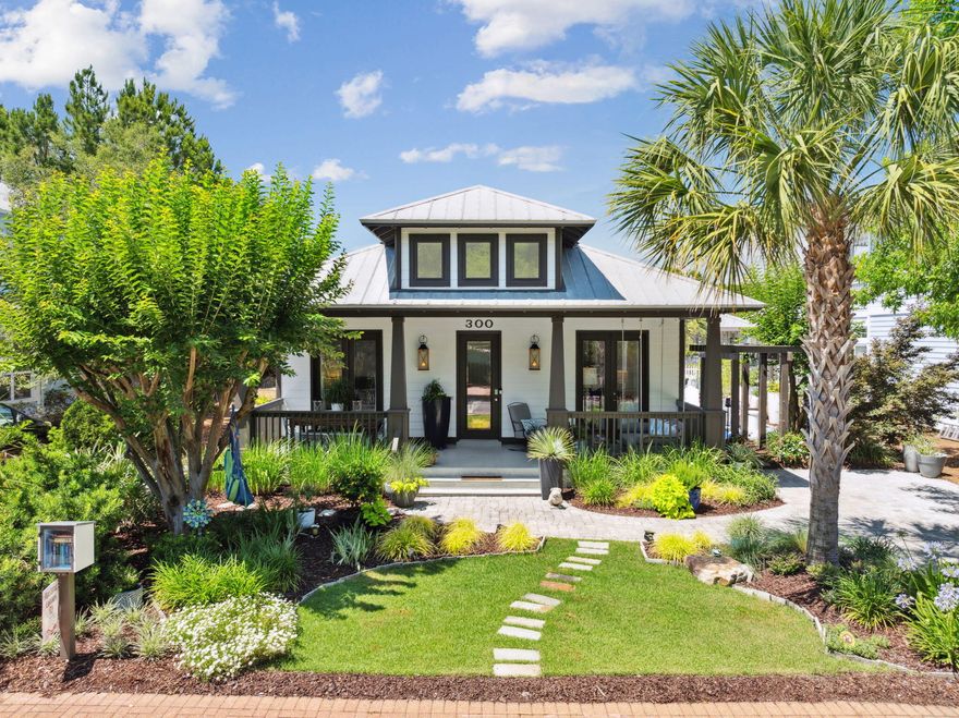 Tucked away in the highly desirable Cassine Village community in Seagrove Beach, this fully renovated 3-bedroom, 2-bath coastal retreat is a rare find along 30A. Offering 1,461 square feet of thoughtfully updated living space, this home stands apart with custom hardwood floors, an updated exterior, and vibrant, well-maintained landscaping that adds to its inviting curb appeal.Inside, the home features a bright, open layout with high ceilings and excellent flow throughout, creating a spacious yet comfortable atmosphere. It comes tastefully furnished in a relaxed coastal style (with most furnishings conveying), and both bathrooms have been beautifully updated with finishes that elevate the overall design.The master suite is a true highlight--generously sized and is a great place to unwind at the end of the day. The tastefully renovated en-suite bathroom features coastal-inspired finishes and carefully chosen details that create a relaxing, functional space. A spacious walk-in closet provides ample storage and organization. The two additional bedrooms are equally inviting, perfect for guests or family, and share a beautifully updated full bath with a fresh, coastal design. 

The living areas transition seamlessly to multiple outdoor spaces each uniquely designed for comfort and connection. The charming front porch features a cozy swing and an outdoor dining area, perfect for slow mornings or sunset meals. The back porch offers a more private setting with a comfortable sitting area and an outdoor TV ideal for watching the game or relaxing with a movie. The side yard adds yet another gathering space, providing a versatile area for entertaining, games, or simply soaking up the Florida sunshine. 

Recent updates include all new windows and glass door panes, spray foam insulation in the attic for enhanced energy efficiency and climate control, and relatively new water heater (2022) and the A/C replacements was replaced in 2018. The attic also offers abundant storage space perfect for beach gear, seasonal d??cor, or anything you'd like to keep tucked away. Two private driveways one in the front and one in the back offer rare parking for five to six vehicles. 

Cassine Village is known for its quiet charm, low HOA fees, and unbeatable location just minutes from one of 30A's convenient public beach accesses. Residents enjoy access to two community pools, as well as pickleball and tennis courts. Whether you're looking for a full-time home, vacation getaway, or investment property, this turn-key gem offers timeless appeal, thoughtful upgrades, and coastal comfort in one of 30A's most beloved neighborhoods.