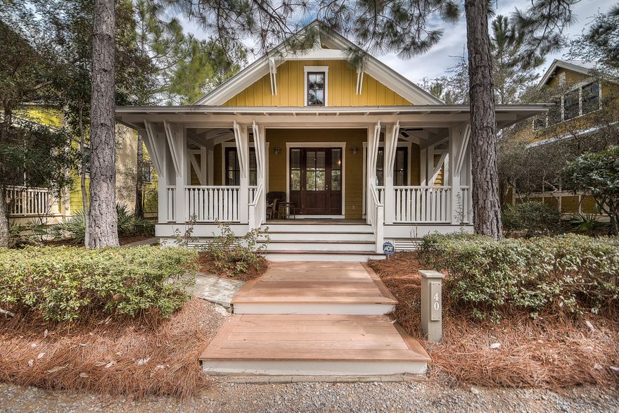 Nestled on a serene and quiet cul-de-sac in Pine Crest of Watercolor, Phase II....this John Willis home boasts a meticulous but casual elegance when you walk through the front doors. Arriving at the home, one is greeted by a spacious front porch. The inviting interior features an open great room, kitchen and dining room. Granite countertops, a large island with stainless,Sub-Zero and Wolf appliances complement custom kitchen cabinetry.Four bedrooms including the master downstairs and a carriage house over a two car garage offer ample space for family and friends. The carriage house has a separate bedroom and living room and kitchen. A bunk/sitting area also provides for overflow visitors.