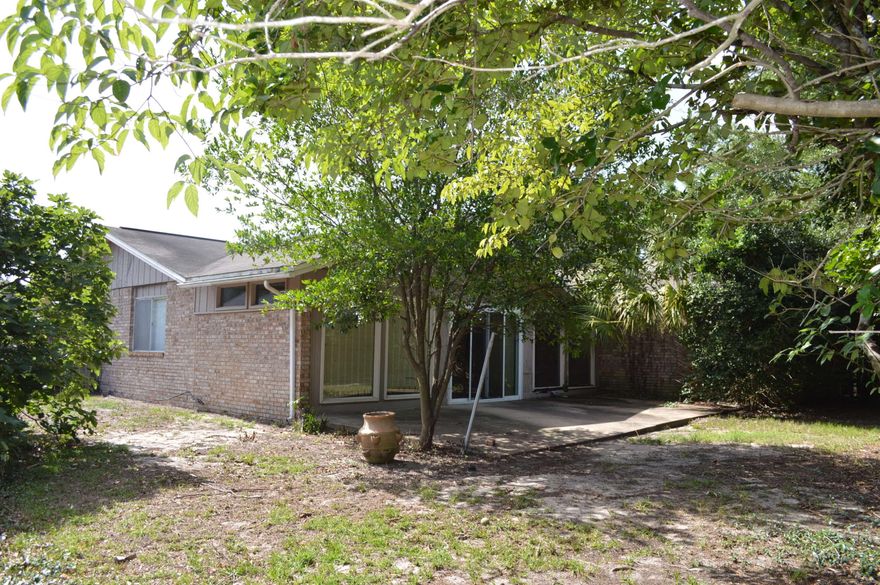 Kenwood is one of Fort Walton Beach's most sought-after communities. Here the owners have a true pride of ownership, while defining Southern hospitality. This home is a real ''diamond in the rough.'' Some renovations will create a wonderful home. Convenient to schools, Eglin Air Force Base and Hurlburt Field. Great floor plan. Large wooded lot on a cul-de-sac. Mostly brick construction with limited wood accents. Privacy fence. Formal living & dining with a great room with fireplace. Kitchen with breakfast bar. Expansive enclosed patio with AC. Mature landscaping. Square footage reflects the added enclosed patio.