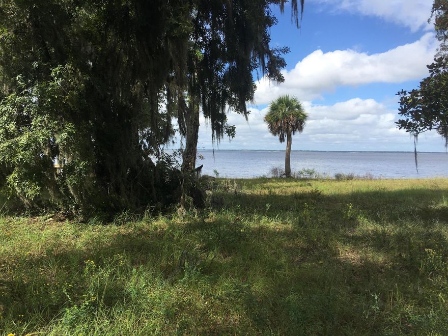This lovely plot in Grayton Bayou  has 50' of Choctawhatchee Bay frontage.  There is a seawall in place, and the neighborhood has a community pool.  Just add your house and a dock and you are ready to live the dream. The new Bayside  Ranchette public park is in the area and offers a place to picnic and launch canoes and kayaks.  Buyer to verify all information, plot dimensions are approximate and should be verified.