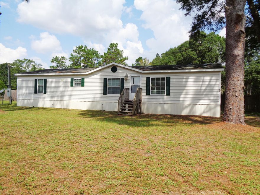 LOCATED ON 2 ACRES, THIS 3 BEDROOM 3 BATH HOME OFFERS OWNER FINANCING. HOME HAS A SPLIT FLOOR PLAN, LARGE KITCHEN, FIREPLACE IN LIVING ROOM, MASTER BEDROOM WITH HIS AND HER BATH WITH WALK IN CLOSEST. NICE LAUNDRY ROOM. BACK YARD IS PRIVACY FENCED.
