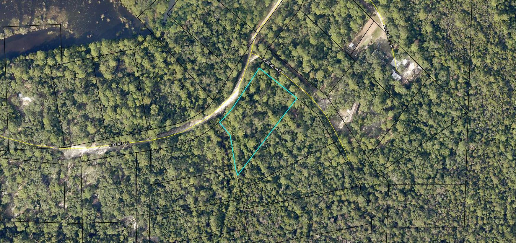 Great lot for your next home! Bring your house plans or manufactured home and homestead this nearly half acre lot as your own. Located in Holt, this property is within a few short miles of I-10. Buyer to verify for themselves all areas of importance such as zoning, setbacks, etc..