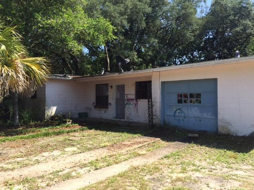 Handyman or Investor Special. The concrete block house built in 1955 has 3 bedrooms and 1 bathroom. The house is in need of TLC. On the property is a detached structure that is also made of concrete block.AS-IS