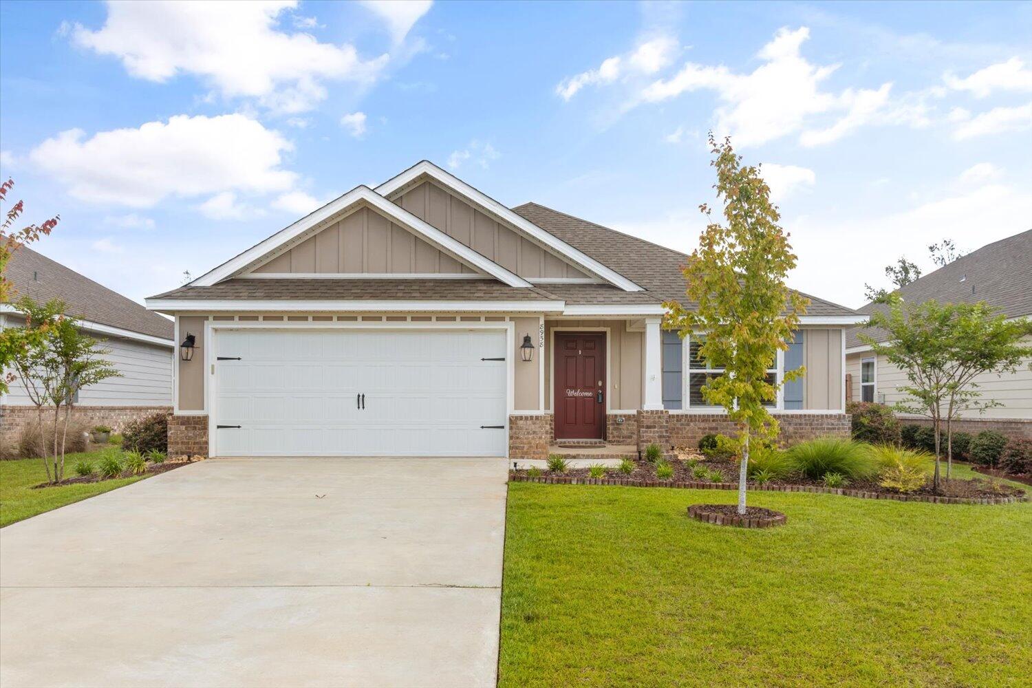Welcome to 8958 Skip Stone! This beautiful 4 bedroom 2 bath home built in 2021 is located in the new Yellow River Ranch development just off of Highway 87. Home is convenient to Navarre & Milton. The Verbena A has an open concept living plan. The landscaped front yard & covered entryway invites you to your front door. The home has granite countertops & luxury vinyl plank flooring throughout the main living areas w/carpet only in the bedrooms. The kitchen has abundant cabinet space, granite countertops, & a single basin sink. Granite in both bathrooms. The back yard is fully fenced in, complete w/covered patio. The view from the back patio shows a great playground area for the kids along with a beautiful community pool, complete w/restroom/washroom.