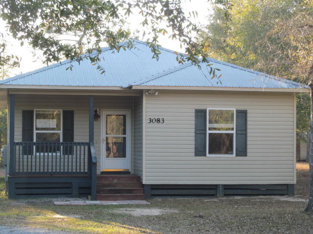 REO. Great 4 bedroom home in north DeFuniak and close to schools. Spacious living room and split floor plan makes this an excellent home for a growing family. Master bedroom features large walk-in closet and the master bath has double vanity sinks. Both the kitchen and bathrooms are tiled. Spacious kitchen features lots of cabinets with plenty of storage in your pantry. Back door enters into laundry room. Fenced back yard is perfect for pets. Schedule you showing today! Property sold ''as-is.''