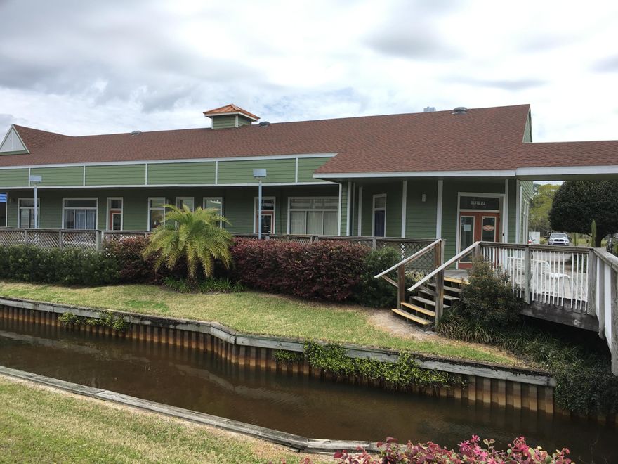 Corner unit with new flooring and paint. Reception area, 5 private offices and conference room.