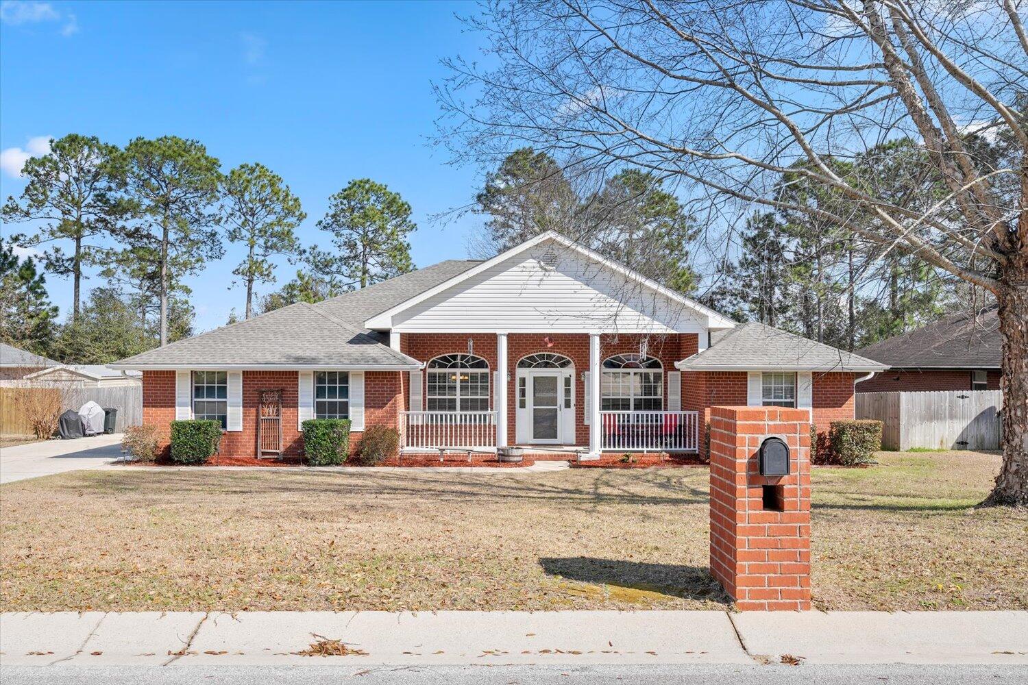 NEW roof, New carpet in bedrooms, HVAC 1 year old. South of I-10, convenient to Duke Field, 7th Special Forces, Eglin AFB.... Upon entry of the home the foyer opens to a dinning room and office space. The living room and kitchen have cathedral ceilings and is the heart of the home. This split floor plan features beautiful bamboo floors in main living areas. The spacious owners suite has tray ceilings and on suite bath boasts his and her sinks, a jacuzzi tub, separate shower, large closets. There is a screened in back porch where you can enjoy your evenings listing to the sounds of nature from the woods behind the property or enjoy your morning coffee on the front porch. Schedule your showing now, you don't want to miss this gem!!!