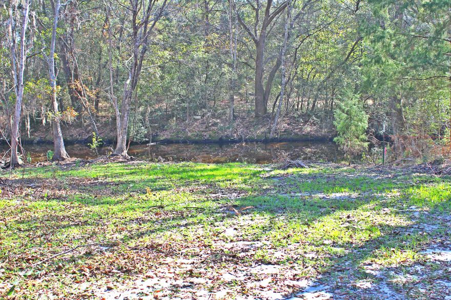 Beautiful waterfront lot that leads to Mallet Bayou & the Choctawhatchee Bay is ready for your dream home! This lot has been cleared to show off the gorgeous oak trees. Water tap is already in place! Survey is also already done and available! Conveniently located to the new Publix and just a short drive from the gorgeous white sand beaches and emerald green waters of the Gulf of Mexico!