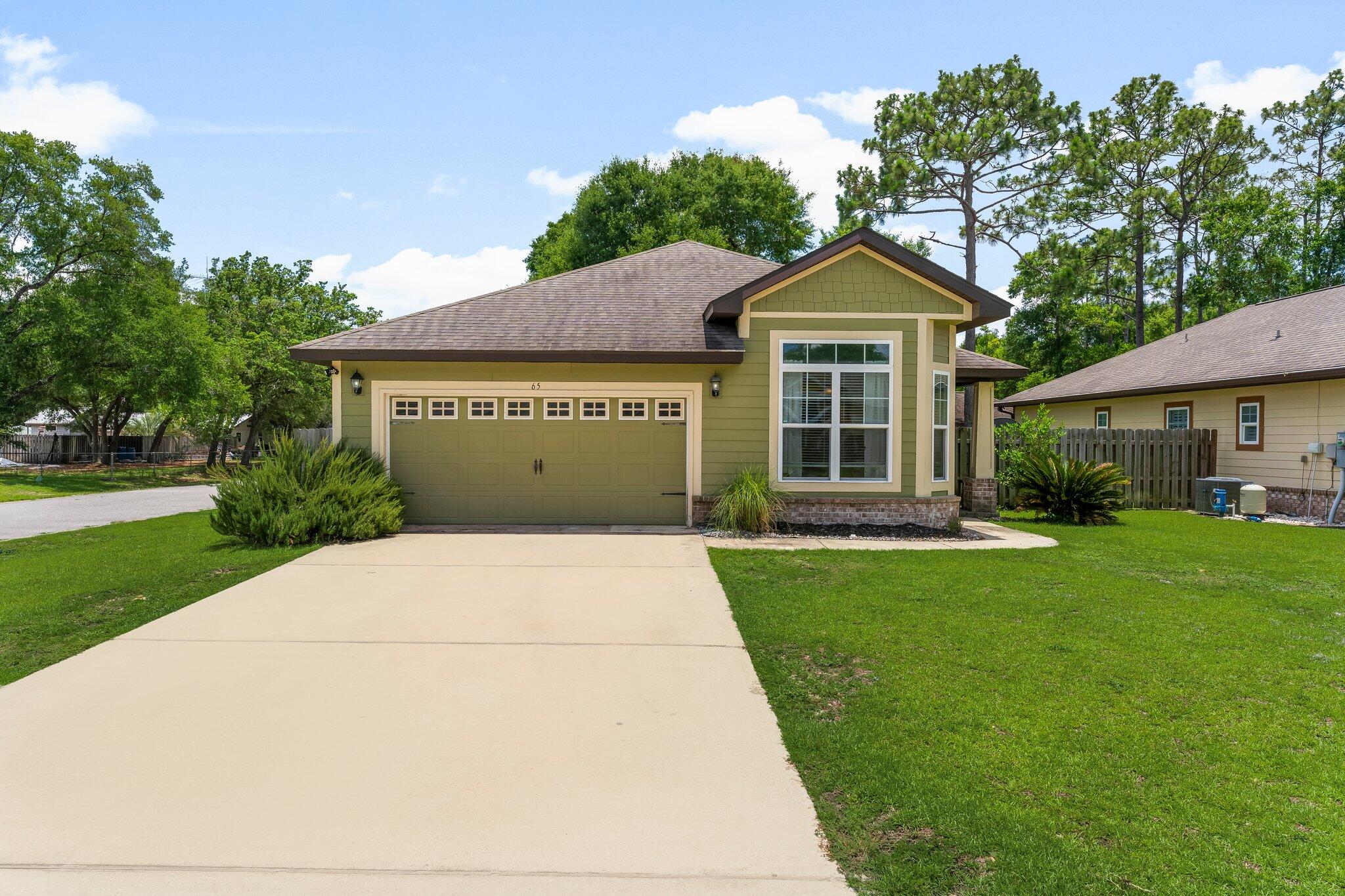 Welcome to this charming 3-bedroom, 2-bathroom home located in the heart of Freeport, FL. This cozy property features a spacious living room, a beautifully updated kitchen with stainless steel appliances, granite countertops and stone backsplash. This home offers three spacious bedrooms and private access from the master suite to the screened porch. Step outside and enjoy a private, fully fenced, backyard perfect for relaxing or entertaining guests in your screened in porch or additional deck. Washer and Dryer included for tenant benefit, as-is. Community pool included! Pets allowed, restrictions apply. If approved, a one time non-refundable pet fee of $200 will apply.