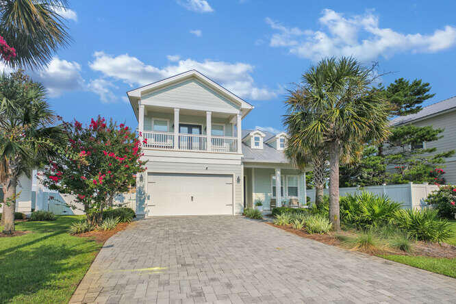 This charming coastal home or potential rental investment in Frangista Beach area is 3 blocks off the beach.  It is located in a gated community in cul de sac and walking distance to beach.  This home, (mostly furnished with exceptions) features 4 bedroom, 3.5 bath, 2 car garage (also two master bedrooms).  The master suite downstairs features a larger walk in closet, a garden tub along with a tile shower. Each master bedroom features a walk out covered balcony area as well.  The master bedroom upstairs is large enough for several beds or bunks. Several upgrades in the home include plantation shutters, privacy fence, engineered hardwood floors, tile bathrooms, all granite surfaces and custom cabinets.