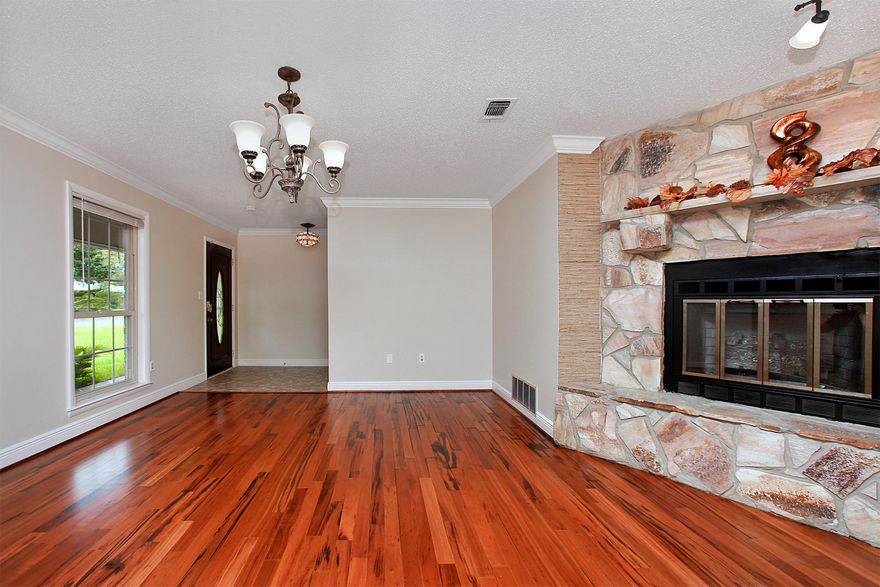 MAKE AN OFFER! This beautiful home has a renovated kitchen with granite counter tops, stainless steel appliances and garbage compactor. The home has been recently painted and the hard wood floors resurfaced. Completely insulated Florida room with a wet bar that faces the nice backyard with privacy fence and two wooden decks that are perfect for entertaining. The master bedroom has a sitting/desk area, two closets and French doors that lead out to one of the wooden decks in the backyard. A sizable master bathroom with garden tub, shower and double sink vanity with extra counter space. This property is equipped with a 'rain soft' system. Conveniently located between Eglin AFB and Hurlburt Field AFB.