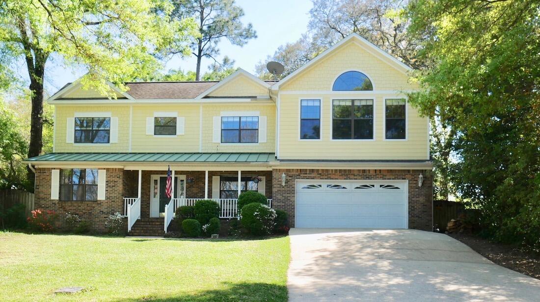 4/30 - Continue to show - active on the market with a 24 hour kick out clause contract in place. Enjoy waterfront living on Boggy Bayou without the huge price tag!! This home, conveniently located in Valparaiso, near Eglin AFB, is across the street from city owned waterfront and just down the street from Lincoln Park's boat launch. Paddle your cares away in your kayak or paddle board or enjoy an afternoon float just steps from your front door. This traditional style home greets you with a welcoming front porch offering amazing sunrise views across the bayou. When you enter this home, you will find the formal dining room to your right and a living room with built-in shelving to the left. Both of these rooms in the front of the house have wonderful water views of the bayou.