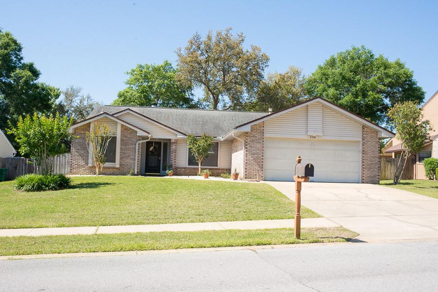Nestled in the Rockywood Community close to Niceville schools, with sidewalks, and plenty of space to play. This community is perfect for your family's next home! The split floor plan with 3 bedrooms and 2 baths has hardwood floors, tile and carpet ( in bedrooms) throughout the home. Two porches, off the house allow for extra room as well as entertainment for family and friends. The kitchen with an eat- in area has granite counter tops, natural gas cook-top as well as stainless steel appliances. The master bath and bedroom have recently been updated to feature a double vanity sink, separate garden tub and shower. The other two bedrooms and bath are located on the other side of the home.