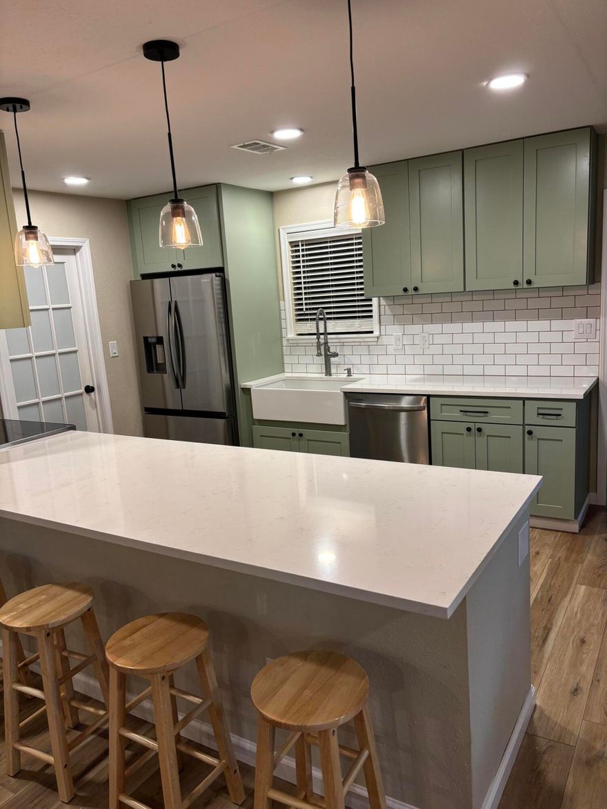 This thoughtfully updated 3BD 2BA home is situated on just under 2 acres in desirable North Crestview, offering privacy in a peaceful wooded setting. Recent improvements (completed 2024) include a new roof, new HVAC,new water heater, updated kitchen, new appliances, cabinets, counter tops and Island. New windows, and new flooring throughout. Just off the kitchen is a bonus room that offers flexible space ideal for a home office, play room, or additional living space. Step outside onto the new covered deck with privacy fencing , creating a secluded outdoor retreat where you truly live amongst the trees. A shop adds versatility for storage, hobbies or workspace.Move -in-ready with room to spread out, this property blends thoughtful updates with space, privacy, and convenience.